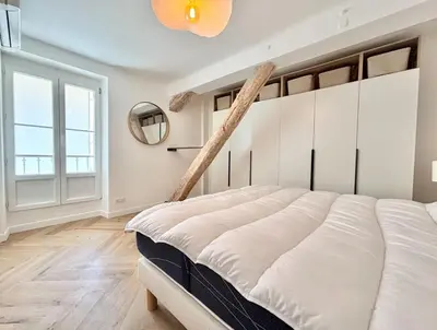 a bedroom with a bed and a window at Cannes 1 bedroom apartment - FC8 in Cannes