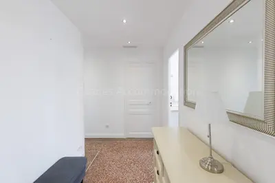 a dressing room with a mirror and a desk at Soeur in Cannes