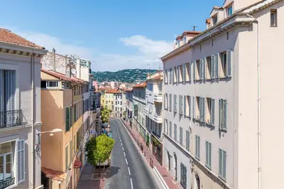 a view of a city street with buildings at Le 45 Clémenceau - Superbe logement proche plages et Palais in Cannes