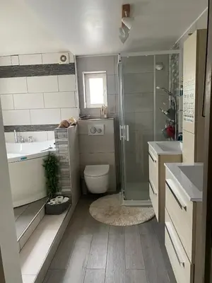 a bathroom with a shower toilet and a sink at Villa piscine cannes 2 chambres in Cannes