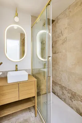 a bathroom with a sink and a glass shower at Résidence Cannes Villa Francia - maeva Home - Appartement climatisé 2 pièces 4 personnes - Prestige - super Home MAE-1343 in Cannes