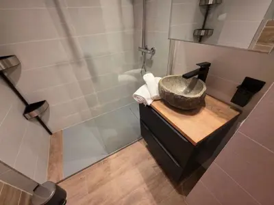 a bathroom with a sink and a shower at Apartment Les Sablons-3 by Interhome in Cannes