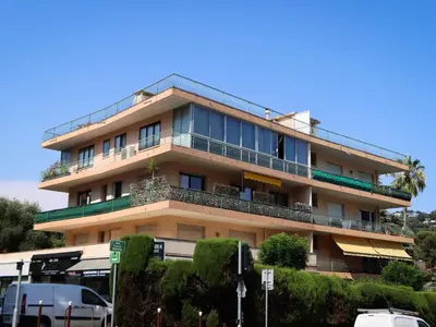 a building with balconies on the side of it at Apartment les Gemeaux by Interhome in Le Cannet