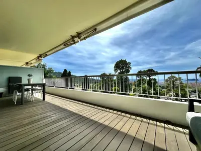 a balcony with a table and a view at appartement cannes in Cannes