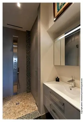a bathroom with a sink and a shower at REF 843 - Cannes Croisette - Sea view apartment for rent in Cannes