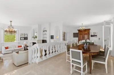 a dining room and living room with a table and chairs at REF 1223 - Cannes - Villa for rent in Vallauris