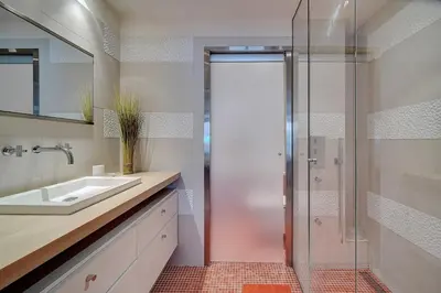 a bathroom with a shower and a sink at REF 1434 - Cannes Croisette - Sea view apartment for rent in Cannes