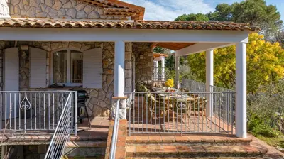 a grill sitting on a patio on a balcony at Villa Lou San Peyre in Le Cannet