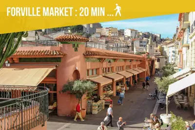 a view of a city with people walking down a street at Elégant 3 pièces avec Terrasse - Centre - Lumineux in Cannes