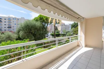 a balcony with a view of the city at 2-Br Apartment Residence with Pool Near La Croisette in Cannes