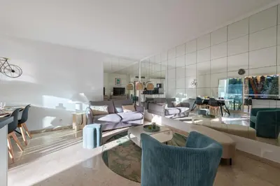 a living room with couches and chairs and a table at 2-Br Apartment Residence with Pool Near La Croisette in Cannes