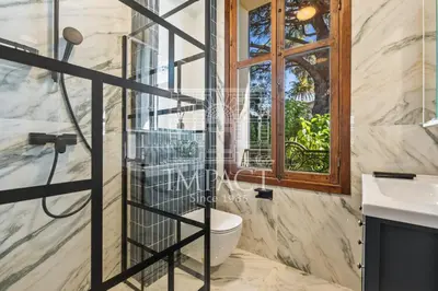 a bathroom with a toilet and a window at Cannes Villa - 2167 - Impact Center in Cannes