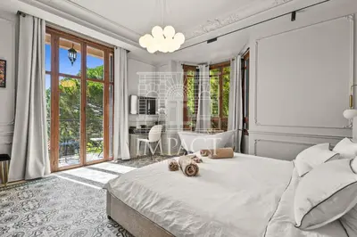 a bedroom with a bed and a large window at Cannes Villa - 2167 - Impact Center in Cannes