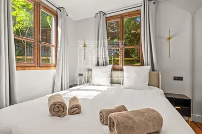 a bedroom with a white bed with towels on it at Cannes Villa - 2167 - Impact Center in Cannes