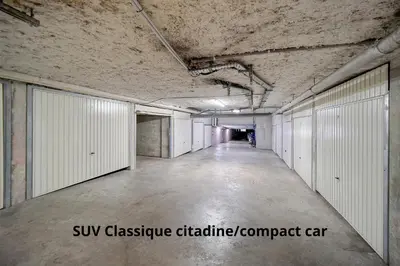 a long hallway with white doors in a building at Lumineux 3 chambres TERRASSE PISCINE PARKING A3B134 in Cannes