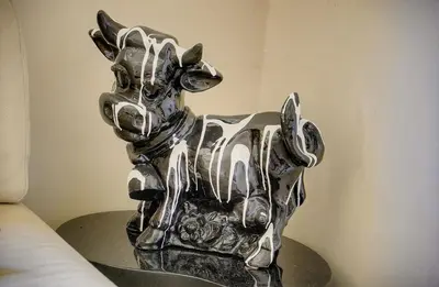 a silver donkey statue sitting on top of a table at Lumineux 3 chambres TERRASSE PISCINE PARKING A3B134 in Cannes