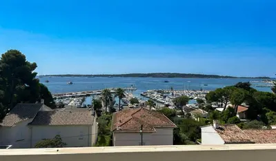 a view of a harbor with boats in the water at Vue mer - Pointe Croisette - 1 chambre Spacieuse in Cannes