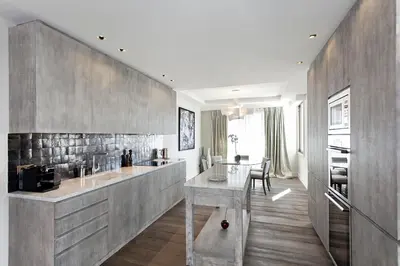 a kitchen with a sink and a counter top at REF 1238 - Cannes Croisette - Sea view apartment for rent in Cannes