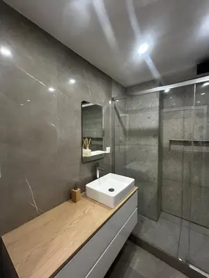 a bathroom with a sink and a shower at Escapade Cannoise in Cannes