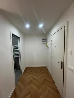an empty room with a door and a hallway at Escapade Cannoise in Cannes