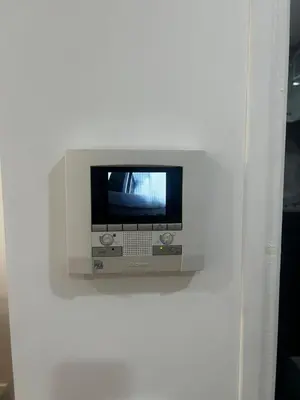 a tv mounted on a wall in a room at Escapade Cannoise in Cannes