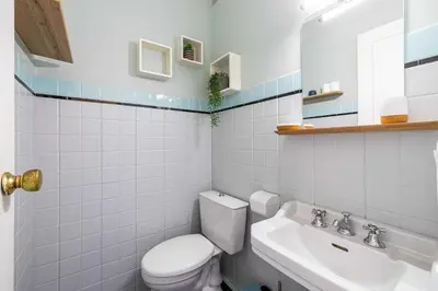 a bathroom with a toilet and a sink at Flat -2BDR-4P - SEA VIEW in Cannes