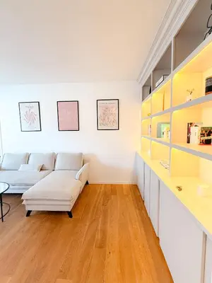 a living room with a couch and a table at Le Noé By ApiRent #Climatisation #Wifi #Balcon in Cannes