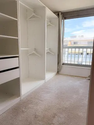 an empty walk in closet with a large window at Le Noé By ApiRent #Climatisation #Wifi #Balcon in Cannes