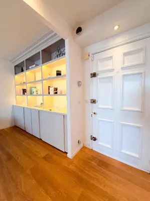 a room with a white door and a wooden floor at Le Noé By ApiRent #Climatisation #Wifi #Balcon in Cannes