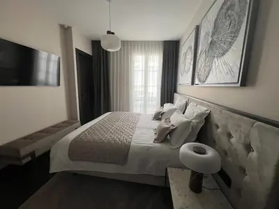a bedroom with a large bed and a window at Cannes hyper centre appartement luxe 5 étoiles terrasse in Cannes