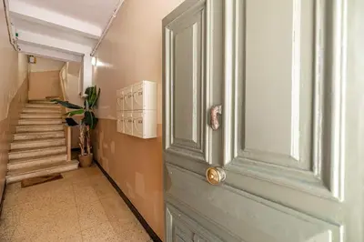 a door leading to a hallway with a stairs at Magnificent apartment - AC- 2BR- 4P - Cannes in Cannes