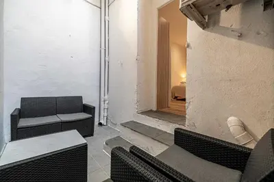 a room with chairs and a couch and a table at Magnificent apartment - AC- 2BR- 4P - Cannes in Cannes