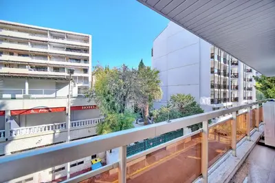 a view from the balcony of a building at REF 1442 - Cannes Center - Apartment for rent in Cannes