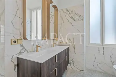 a bathroom with a sink and a mirror at REF 783 - Cannes Croisette - Apartment for rent in Cannes
