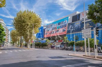 an empty street in a city with buildings at REF 783 - Cannes Croisette - Apartment for rent in Cannes