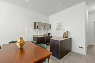 a dining room with a table and chairs at REF 783 - Cannes Croisette - Apartment for rent in Cannes