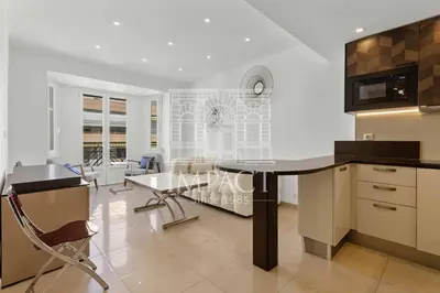 a kitchen and dining room with a table and chairs at REF 2019 - Apartment for rent Cannes Center in Cannes
