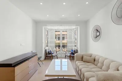 a living room with a couch and a table at REF 2019 - Apartment for rent Cannes Center in Cannes