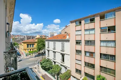 a view from the balcony of a building at Cosy Duplex Mimosa Cannes Center - Happy Rentals in Cannes