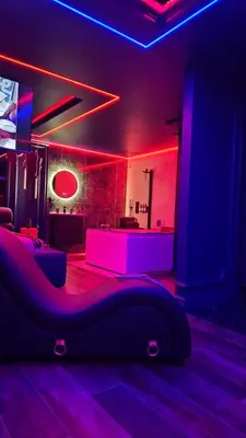 a green bathroom with a tub and a sink at Love room - Xtase By luxuria Cannes in Cannes
