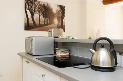 a tea kettle on a counter in a kitchen at Le Meynadier Center-Festival-Clim-WiFi in Cannes