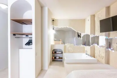 a collage of photos of a room with a poster at Caldera - SPA & Climatisation & Proche Croisette in Cannes