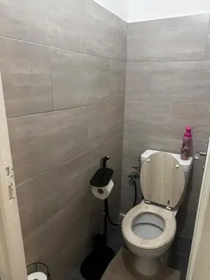 a small bathroom with a toilet in a room at 3-room apartment with sea view in Cannes in Cannes