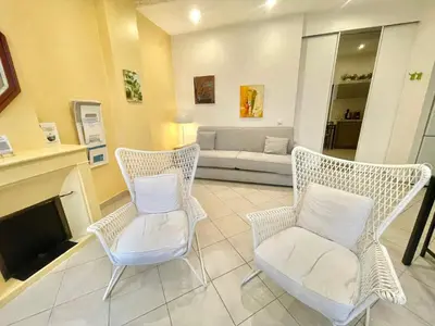 a living room with two chairs and a couch at Mont Chevalier by Welcome to Cannes in Cannes