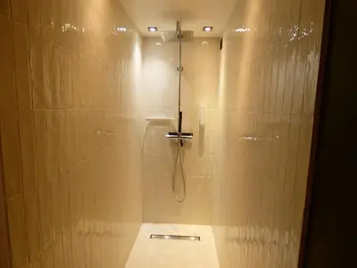 a shower stall in a bathroom with a shower at Cannes - LE DOLCE appartement de charme - 3 chambres - piscine in Cannes
