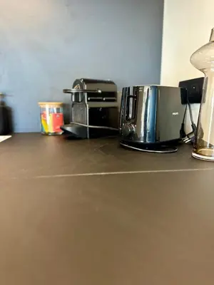 a counter top with two toasters and a toaster at Studio lumineux 5 minutes Croisette et rue Antibes in Cannes