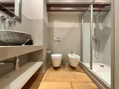 a bathroom with a sink and a toilet and a shower at Cozy 1 Bedroom apartment hypercentre in Cannes