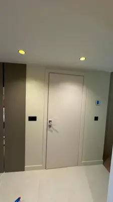a white door in a room with at Renovated & cozy apartment in Cannes