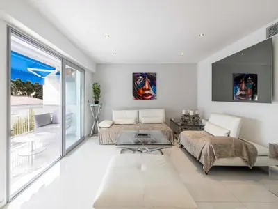 a living room with a couch and a glass table at Beautiful Apartment with Balcony 1BR 2P - Cannes in Cannes