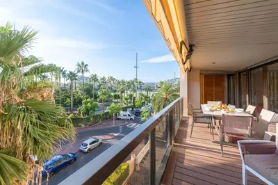 a balcony of a house with a view of a street at Beautiful 2-Br Apartment Sea View Beaches Within Walking Distance in Cannes